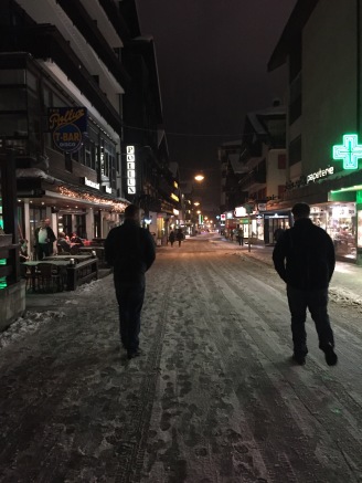 Tyler and Brice walking through the town.